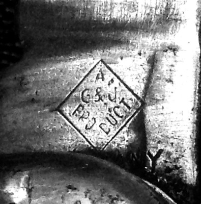 The Main Blade Front Tang Stamp.<br />"A (over) G &amp; J (over) PRODUCT (over) GERMANY(?)