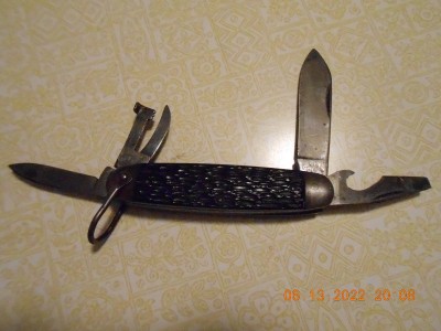 Pal with old style 2 piece can opener