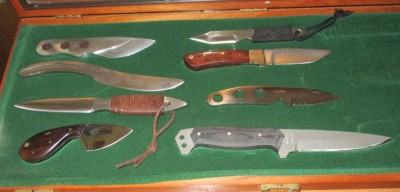 I do have my "keepers" from Dad's collection. The aluminum knife with inlayed wood is one of them. It is among his very earliest knives. I remember when he brought it in to show Mom and me when he finished it. I said, "You can't ever sell this knife! It's mine!" And he never did sell it. :-)