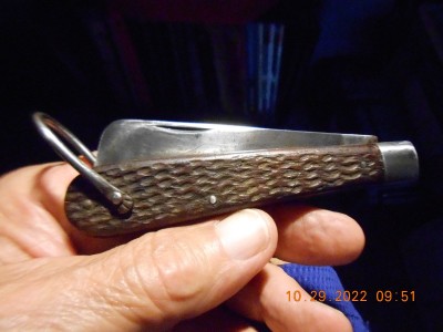 Had some spots and scratches on the blade, plus it has been tipped.
