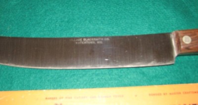 village.blacksmith.steak.scimeter.etch.jpg