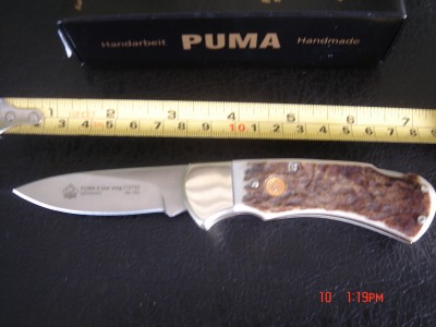 And a new mod 4" 4 star, again not a shabby knife BUT ..........