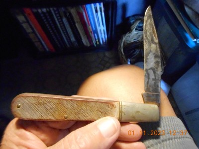 Badly stained and etched blade
