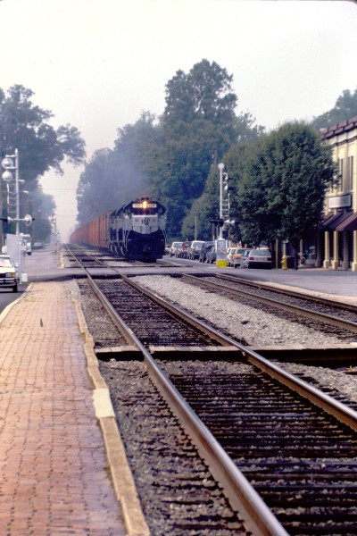 RF&P GP35 134 & 138 & GP40-2 141 lead the Juice Train through Ashland VA 1110 HRS 7-11-88 (1).JPG