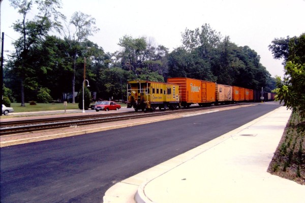 RF&P GP35 134 & 138 & GP40-2 141 lead the Juice Train through Ashland VA 1110 HRS 7-11-88 (4).JPG