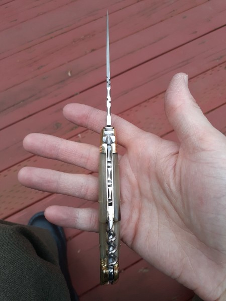 Forged fly, hand filed decoration is a bit coarse and uneven.