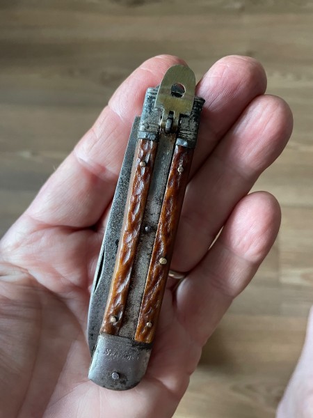 Photos of repaired knife after the shell puller guards broke off.