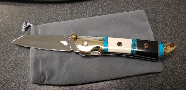 ivory knife maker side.jpg