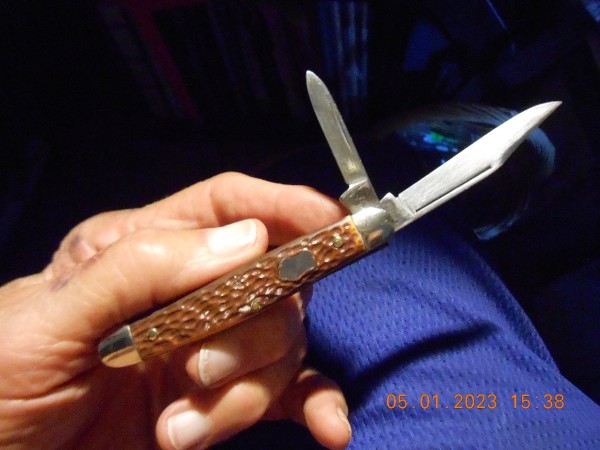 Delrin handled Klein Tools-has a "T" on the pile side of the clip.