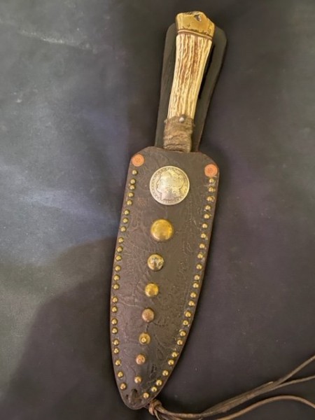 Mountain man knife with Morgan Dollar on sheath