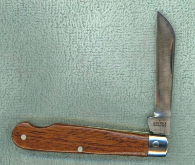 The handles are Brazilian Cherry wood, left over from a flooring job my son did.