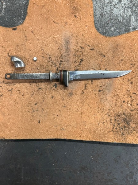 Pommel removed.