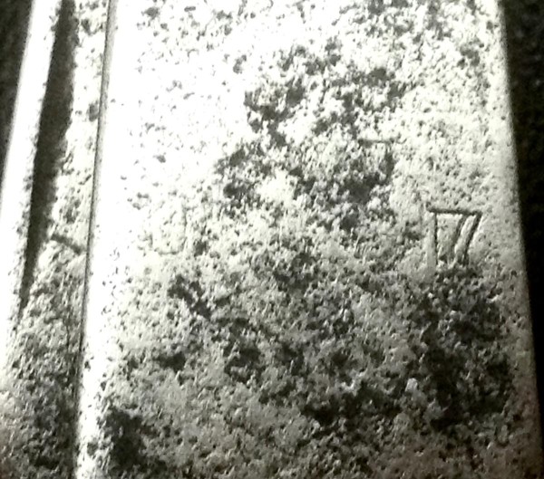 The Faint Remains Of The Handle Stamp.