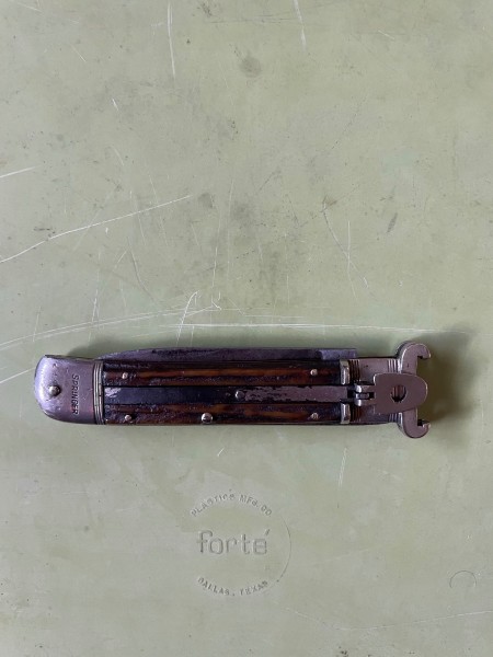 Finished repaired knife. Blade “sits”” deeply against the spring tension.