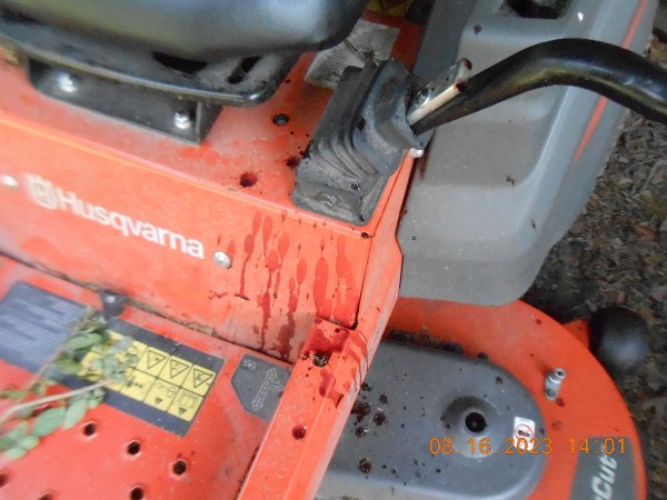 That's my blood all over the mower, tiny snag on the back of my left hand by a dried black-berry thorn.