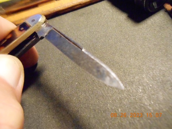 All the blades have this swedge with a long pull back to the tang.