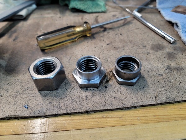 Left - what I started with.  Middle - nut in work.  Right - OEM nut