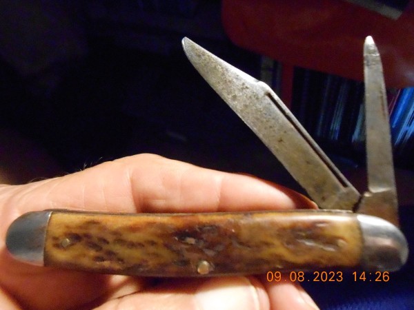 A HOK for sure, well used and worn.