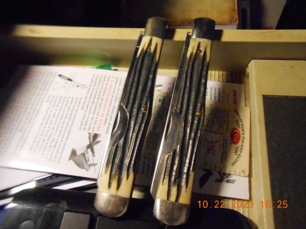 Twins, a few scratches and a bit of blade loss, not too bad for at least 52 year old knives.