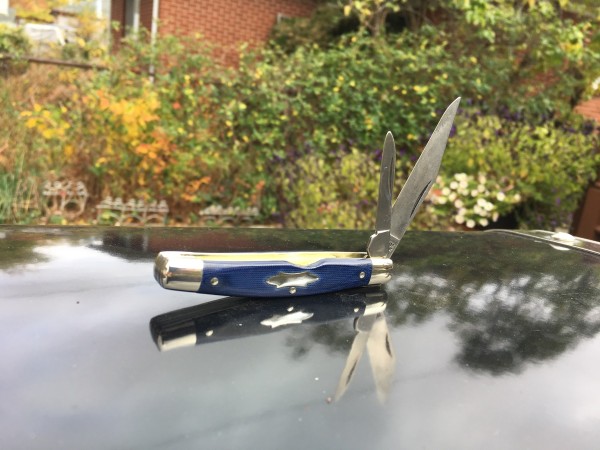 Schrade 33ot with blue linen Micarta handles