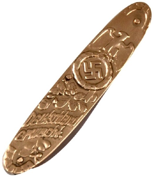 Picture #5b. - "Adolf Hitler Pocket Knife with "Meine erhe Heist Treue" Inscription features a likeness of Adolf Hitler on one side and "Deutschland Erwache" on the other, with the SS motto inscription "Meine erhe Heist Treue" (My Honor is Loyalty) on the blade. The solid brass scales of these knives house very sharp, stainless steel blades. Overall length is 3-3/4” with 2-1/2" blades. Price $12.95"