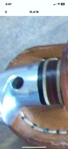 Pommel with hole