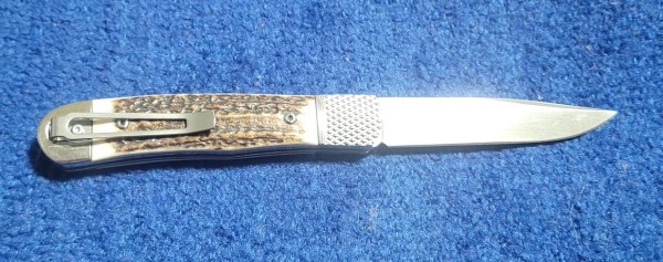 Cobratec stag automatic trapper clip.jpg