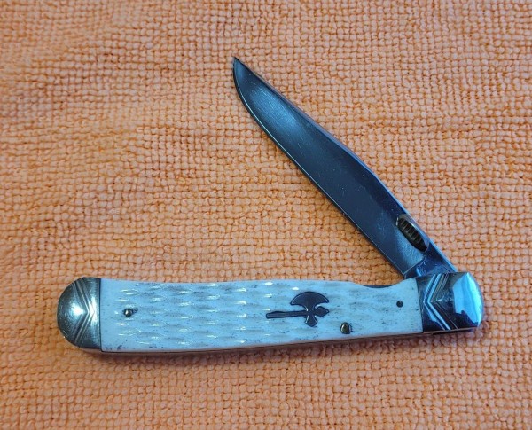 RR Battle Axe White Bone Trapper Lock.jpg