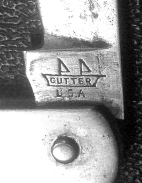 The Main Blade Front Tang Stamp.<br />Per GOINS (1998 edition).....<br />"CUTTER (picture of a ship) c 1850-1944 A trademark used by T. Ellin &amp; Company."<br />"CUTTER USA g 1930-1960"
