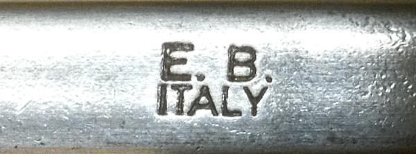 The "Maker" Stamp On The Cap Lifter Or Bottle Opener.