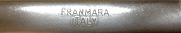 The "Maker" Stamp On The Cap Lifter Or Bottle Opener.