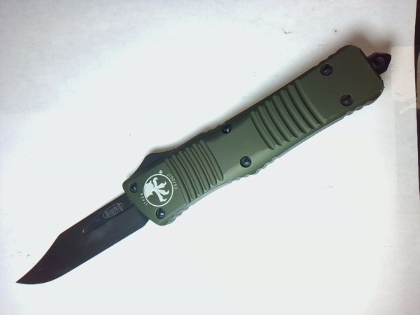 My Combat Troodon at Microtech Repair 04262023 (2).jpg