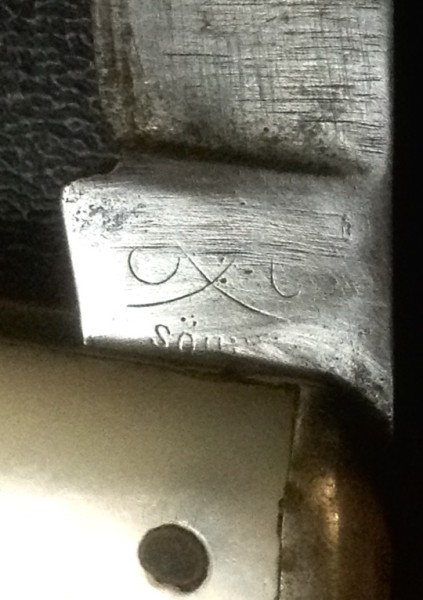 The Main Blade Front Tang Stamp.