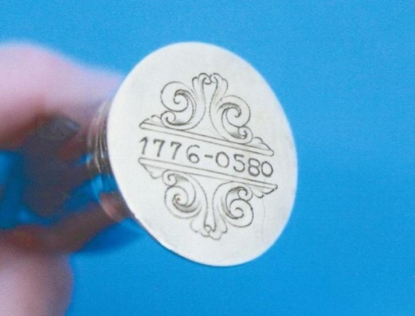 Browning B78 Bicentennial 5518 Engraved Knife Butt End.jpg