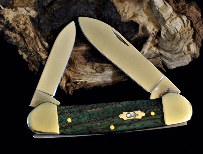 Case Green Zebra Wood Canoe 2019.jpg