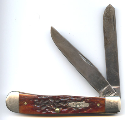 That's not a chip in the spey blade, just a funny reflection... It's getting a nice patina, though, as time goes by.
