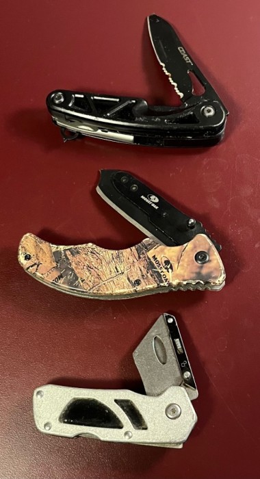 A Coast, a Mossy Oak, and Husky razor knife
