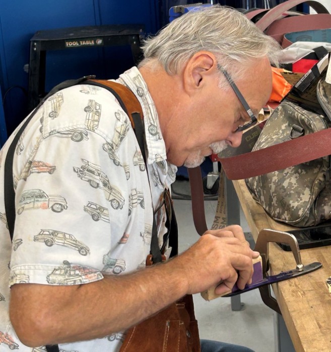 Dan Hand Sanding His Bevel.jpeg