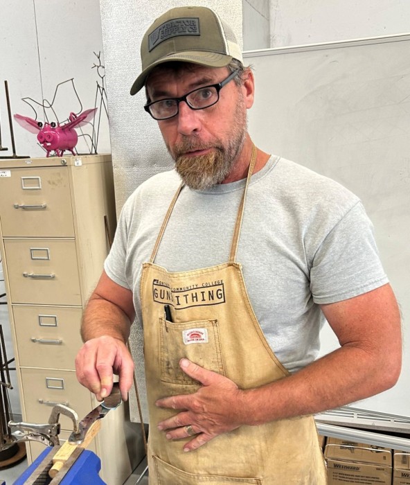 Cliff Hand Sanding His Bevel.jpeg