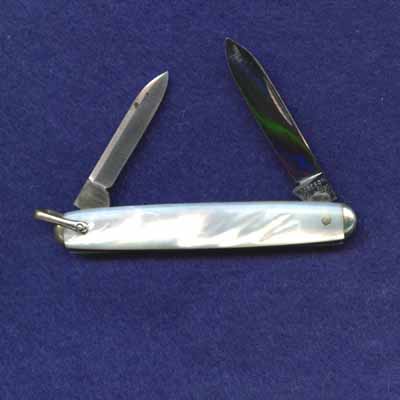 Two blade tip bolstered pen with bail. 2 3/4".<br />Pattern number 722003.
