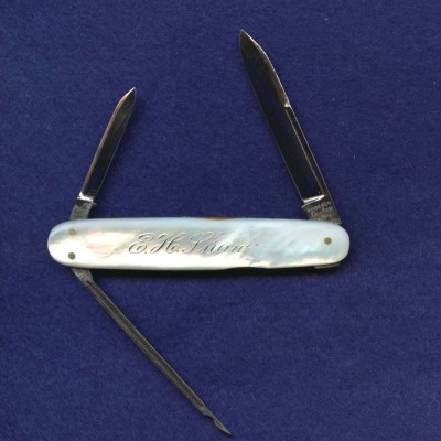 3 1/8" equal-end lobster.<br />Front handle etched, "E. H. Shaw".<br />Pattern number 735231.