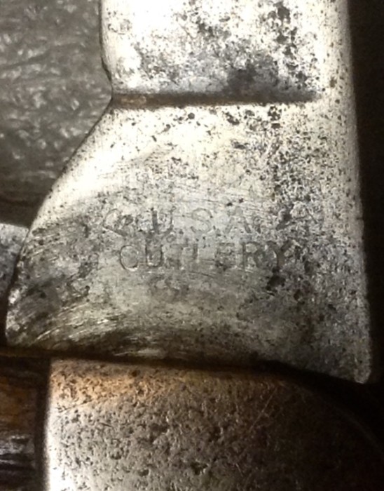 The Secondary Blade Front Tang Stamp.<br />"ROBESON (over) U.S.A. (over) CUTLERY"