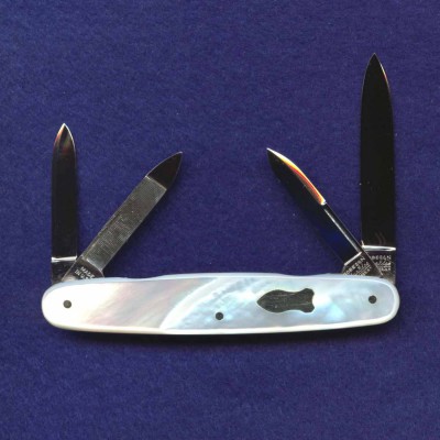 A 3 5/16" shadow four blade senator.<br />All long pulls.<br />This knife has covered backsprings.<br />All long pulls. Bomb shield.<br />Pattern number 742089.
