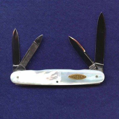 Another 3 5/16" shadow four blade senator.<br />All long pulls.<br />Gold toned PocketEze shield.<br />All long pulls.<br />Pattern number 742198.