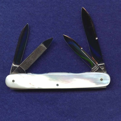 A 3 5/16" shadow senator. PocketEze construction<br />with a nail ease for each blade.<br />All long pulls.<br />Pattern number 743006.