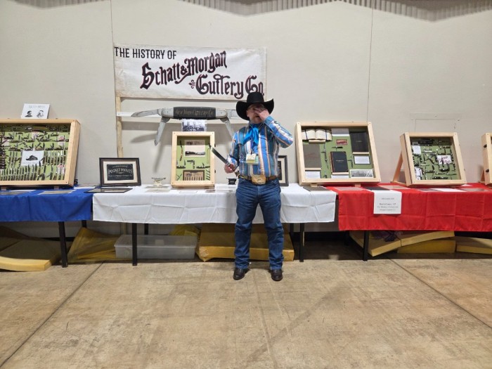 Dave in front of his display, with his award knife.