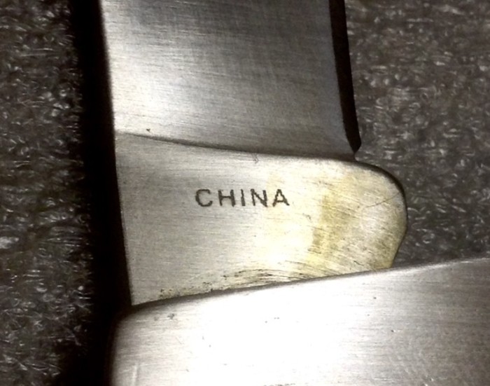 The Main Blade Back Tang Etch.
