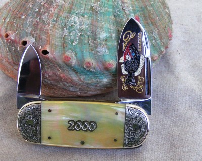 1 of 24 Gold lip pearl with after market engraving