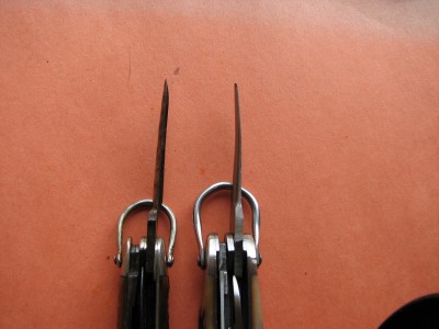 Note how much more the repro awl is crinked than the original