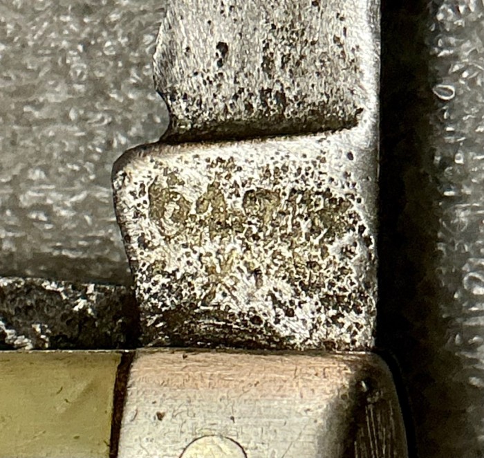 The Main Blade Front (worn) Tang Stamp.